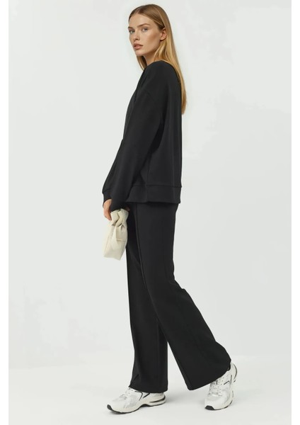 Kadın Modal Touch Nervür Detaylı Geniş Paça Pantolon Siyah indirimleri