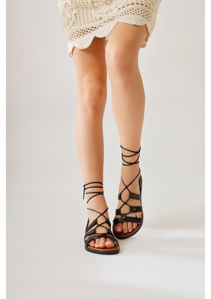 Hakiki Deri Ruut Siyah Perçin Detaylı Bilekten Bağlamalı Sandalet fiyatları