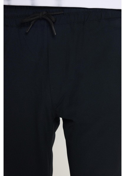 Erkek Slim Fit Dar Kesim Pamuklu Lastikli Beli Bağcıklı Lacivert Pantolon modelleri
