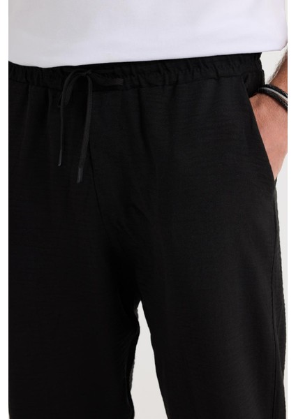 Erkek Standart Fit Normal Kesim Beli Bağcıklı Geniş Paça Siyah Pantolon modelleri