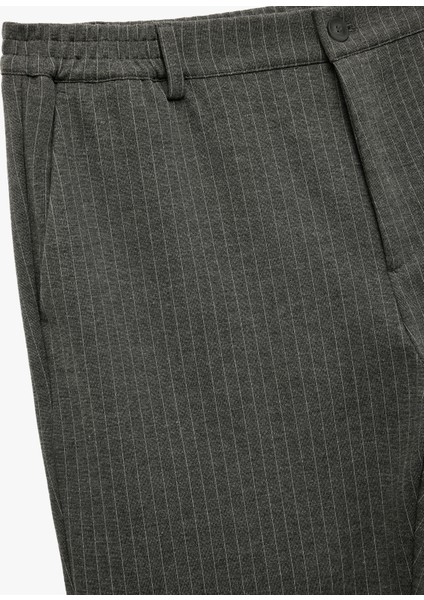 Viskon Karışımlı Cepli Regular Fit Çizgili Pileli Kumaş Pantolon modelleri