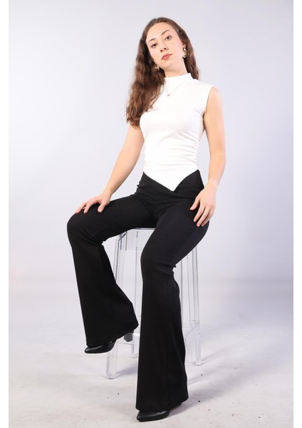 10642 Eteği Asimetrik Balıkçı Kolsuz Bluz indirimleri