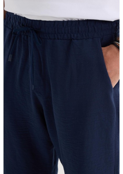 Erkek Standart Fit Normal Kesim Beli Bağcıklı Geniş Paça Lacivert Pantolon modelleri