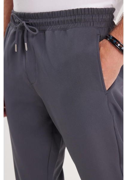 Erkek Regular Fit Beli Lastikli Bağcıklı Jogger koyu Gri Pantolon Rahat Kesim Yan Cepli modelleri