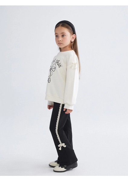 Lcw Kids Ekru Bisiklet Yaka Fiyonk Nakışlı Uzun Kollu Kız Çocuk Sweatshirt ve Tayt fiyatları
