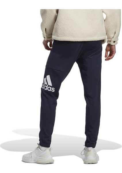 Sportswear IC9428 Essentials Single Jersey Tapered Badge of Sport Eşofman Altı