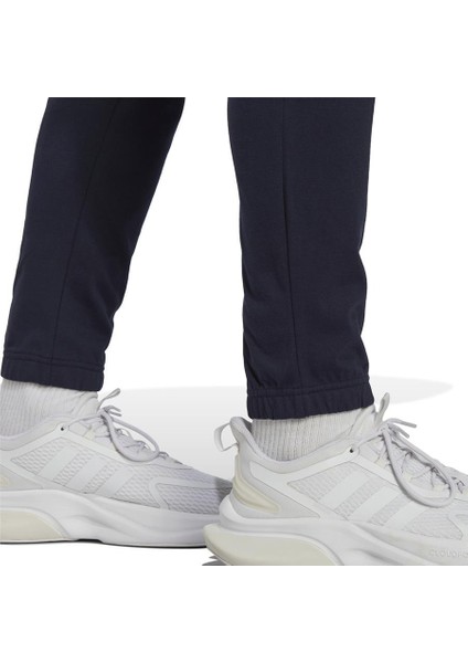 Sportswear IC9428 Essentials Single Jersey Tapered Badge of Sport Eşofman Altı