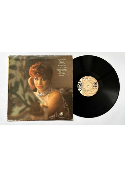 Nil Burak - Iki Elim Yakanda (Dönem Baskı) Lp Plak (107.5) PLK21986 fiyatları