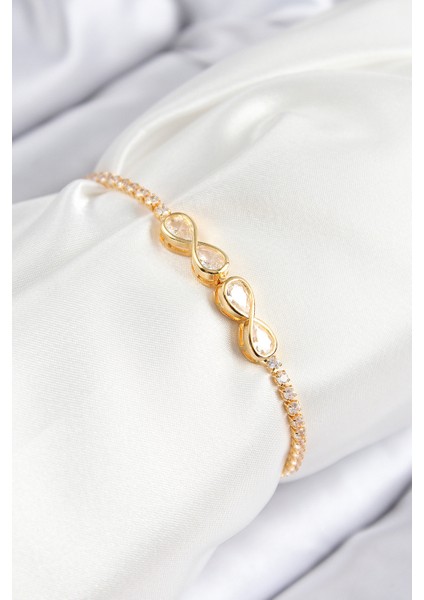 Pirinç Zirkon Taşlı Sonsuzluk Model Gold Renk Asansörlü Kadın Bileklik - Lisinya
