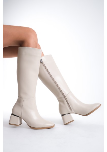 Kadın Diz Altı Krem Topuklu Parlak Detaylı Fermuarlı Deri Görünümlü Uzun Çizme fiyatları