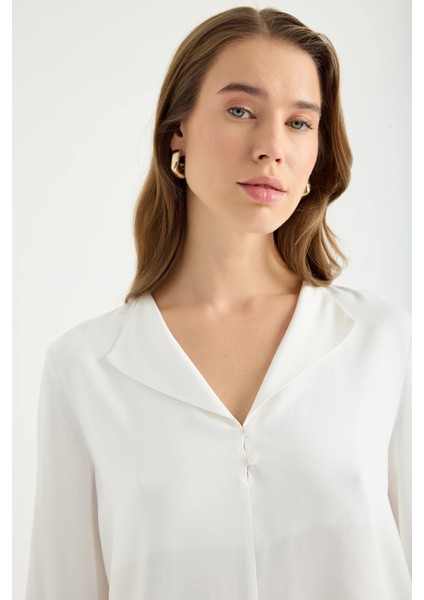 Dökümlü Devrik Yaka Bluz fiyatları