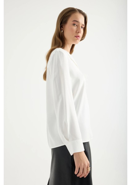 Dökümlü Devrik Yaka Bluz indirimleri