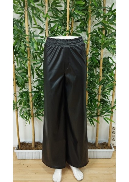 Kadın Yüksek Bel Beli Lastikli Geniş Paçalı Deri Pantolon