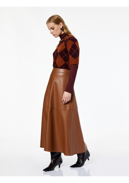 x Melis Ağazat - Volanlı Kloş Kesim Midi Suni Deri Etek fiyatları