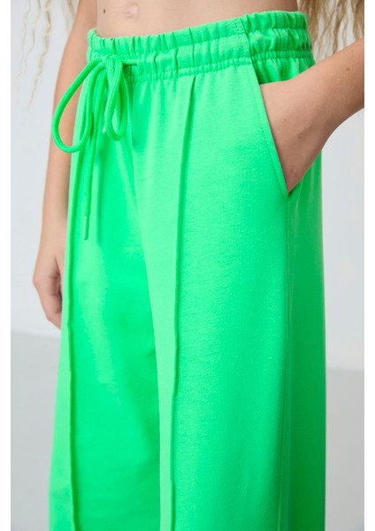 Neon Yeşil Cepli Ön Dikiş Detaylı Geniş Paça Kız Çocuk Eşofman Altı -75144 fırsatları