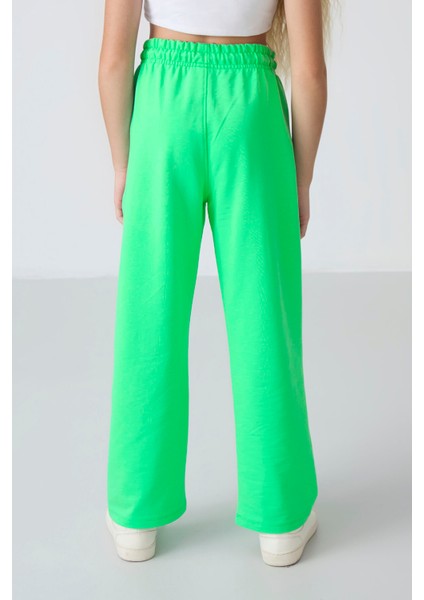 Neon Yeşil Cepli Ön Dikiş Detaylı Geniş Paça Kız Çocuk Eşofman Altı -75144 indirimleri