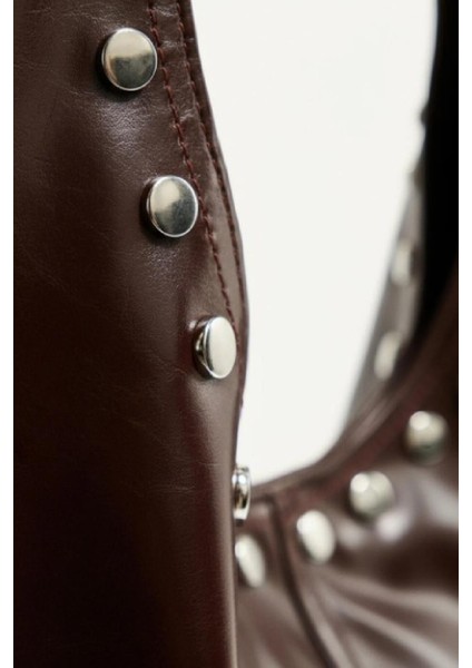 Sap Kenarları Zımbalı Salaş Kol Çantası indirimleri