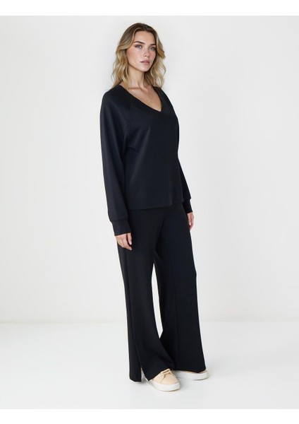 Siyah Yüksek Bel Bol Paça Cep Detaylı Örme Pantolon modelleri