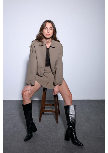 Haki Pileli Zincir Detaylı Şort Etek fiyatları