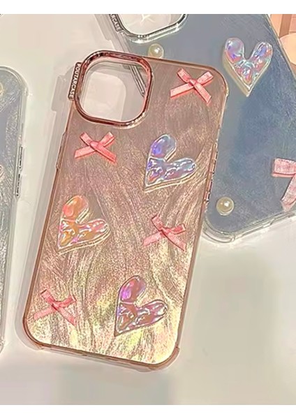 IPHONE 13/14/15 Uyumlu Rose Gold Simli 3D Fiyonk ve Kalp Dekorlu KILIF15 modelleri