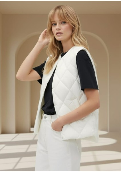 -Yelek Kapitone Yuvarlak Yaka Çıtçıtlı Luana Anaeta