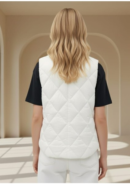 -Yelek Kapitone Yuvarlak Yaka Çıtçıtlı Luana Anaeta fırsatları