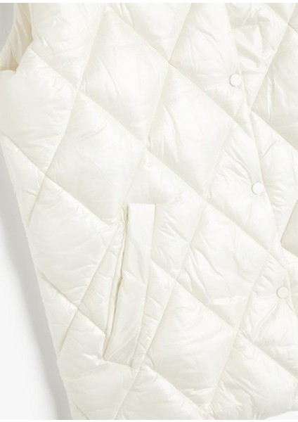 -Yelek Kapitone Yuvarlak Yaka Çıtçıtlı Luana Anaeta