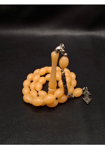 Karanlıkta Fosforlu Beyzi Kesim Toz Kehribar Tesbih fiyatları