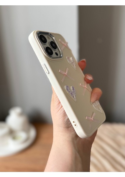 IPHONE 15 Pro Max 3D Fiyonk/kalp Dekorlu Ekru Kılıf modelleri