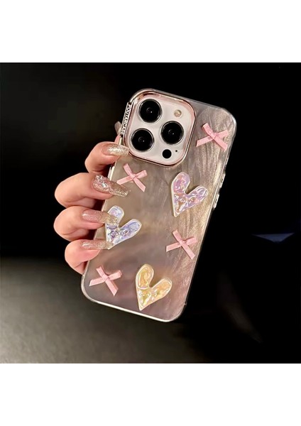 IPHONE 15 Promax Rose Gold Simli 3D Fiyonk ve Kalp Dekorlu Kılıf fiyatları