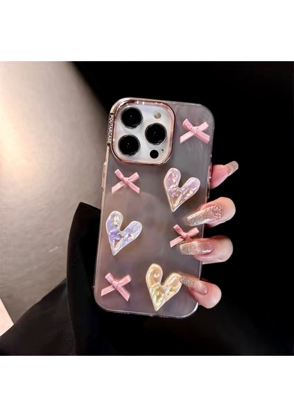 IPHONE 15 Promax Rose Gold Simli 3D Fiyonk ve Kalp Dekorlu Kılıf modelleri