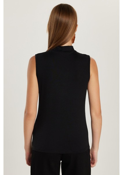 Kadın Standart Fit Normal Kesim Sıfır Kol Yarım Balıkçı Yaka Siyah Bluz indirimleri