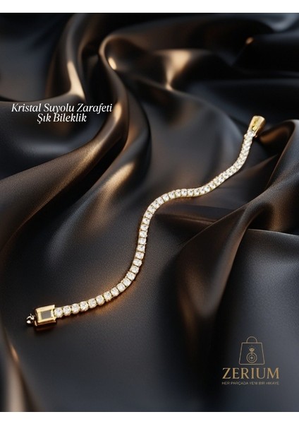 Kristal Suyolu Zarafeti – Altın Renk Detaylı Şık Bileklik
