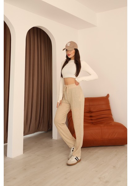 Bej Yumoş Yüksek Bel Bağlamalı ve Paça Lastik Detaylı Eşofman Altı fırsatları