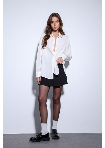 Siyah Pileli Zincir Detaylı Şort Etek