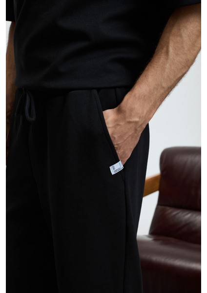 BARNABY Erkek Kolu ve Pantolon Cebi Süs Etiket Detaylı Yuvarlak Yaka Siyah Alt-Üst Takım