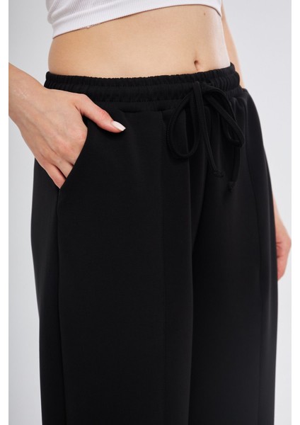 Siyah Ultra Yumuşak, Dikiş Detaylı Havuç Kesim Bağcıklı Lastikli Bilek Boy Kadın Modal Pantolon