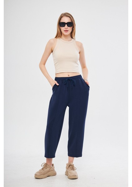 Lacivert Ultra Yumuşak, Dikiş Detaylı Havuç Kesim Bağcıklı Lastikli Bilek Boy Kadın Modal Pantolon fiyatları