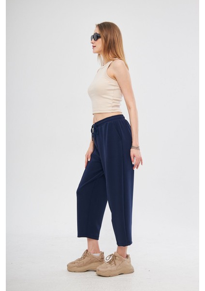 Lacivert Ultra Yumuşak, Dikiş Detaylı Havuç Kesim Bağcıklı Lastikli Bilek Boy Kadın Modal Pantolon fırsatları