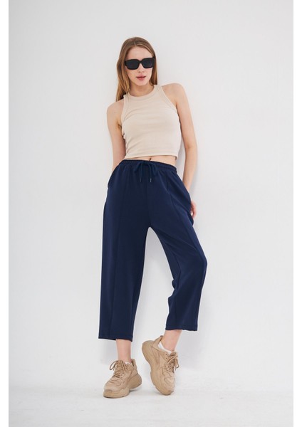 Lacivert Ultra Yumuşak, Dikiş Detaylı Havuç Kesim Bağcıklı Lastikli Bilek Boy Kadın Modal Pantolon indirimleri