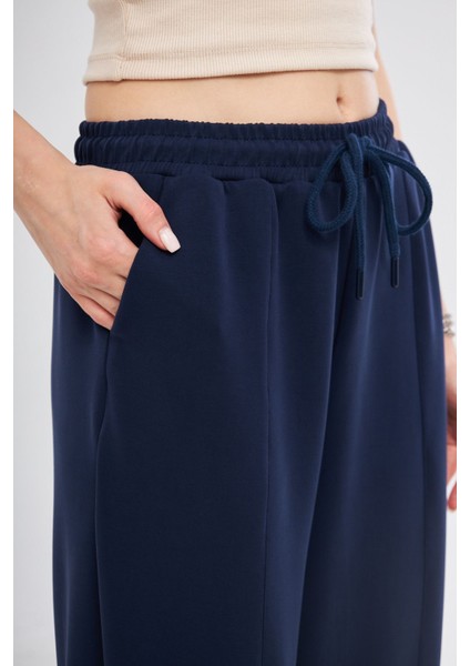 Lacivert Ultra Yumuşak, Dikiş Detaylı Havuç Kesim Bağcıklı Lastikli Bilek Boy Kadın Modal Pantolon