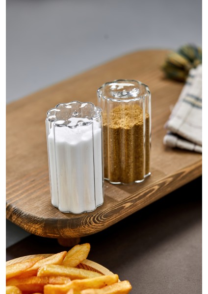 2’li Dalgalı Cam Tuzluk ve Biberlik Takımı – Şeffaf, Modern Silindirik Tasarım, Sızdırmaz Kapaksız Baharatlık Seti fiyatları