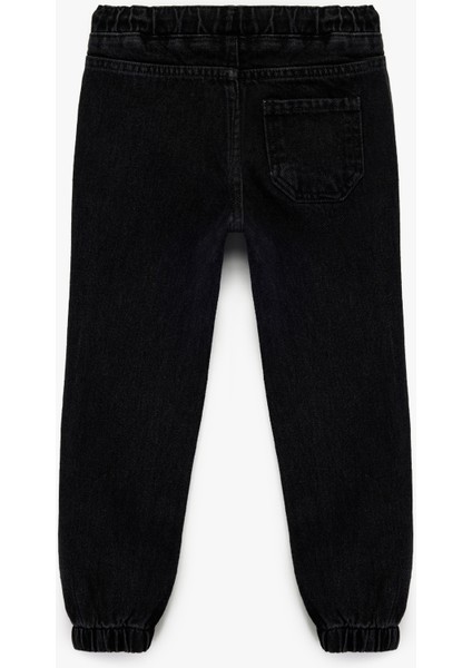 Pamuklu Rahat Kesim Beli Bağcıklı Jogger Denim Pantolon fiyatları