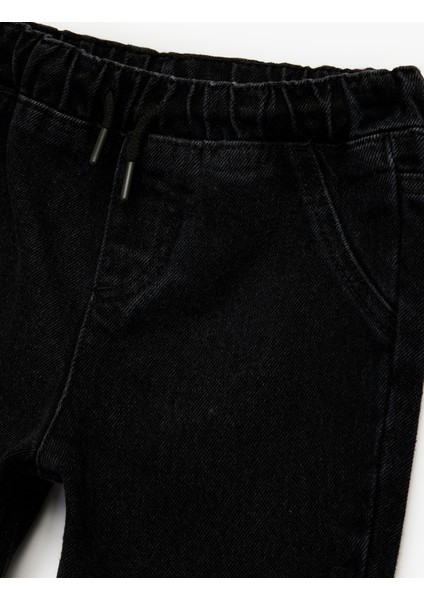 Pamuklu Rahat Kesim Beli Bağcıklı Jogger Denim Pantolon modelleri