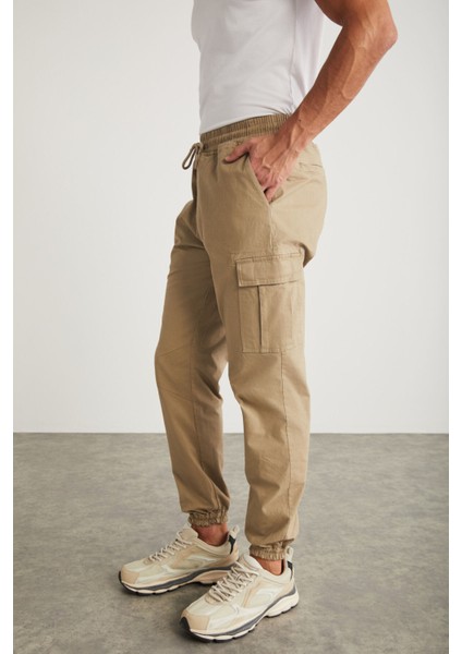Cargo Erkek Dokuma Kargo Cepli Beli Ve Paçası Lastikli Bej Pantolon modelleri