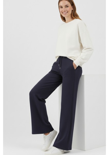 Pamuklu Kadın Eşofman Altı Yüksek Bel Lacivert Flare Fit Geniş Paça Ipli Cepli Esnek Yumuşak Likra indirimleri