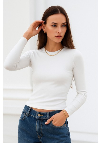 Kadın Ekru Bisiklet Yaka Esnek Kumaşlı Vücuda Oturan Slim Fit Uzun Kollu Crop Body fırsatları