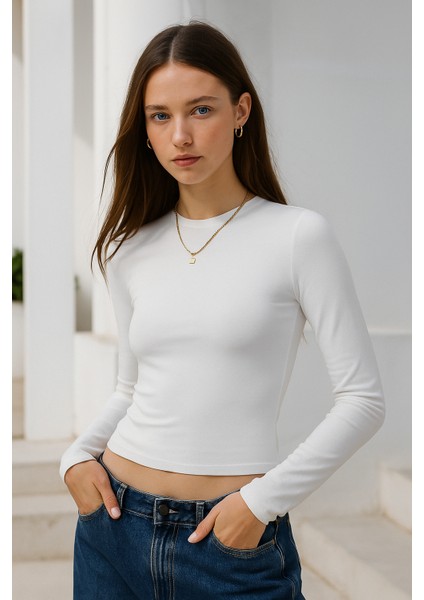 Kadın Ekru Bisiklet Yaka Esnek Kumaşlı Vücuda Oturan Slim Fit Uzun Kollu Crop Body indirimleri