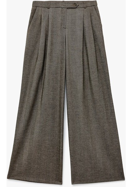 Kadın Koton x Sima Tarkan - Cepli Pile Detaylı Geniş Paça Palazzo Pantolon 6WAK40073EW fırsatları