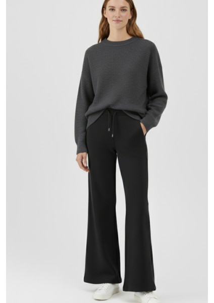 Pamuklu Kadın Mevsimlik Eşofman Altı Yüksek Bel Siyah Flare Fit Geniş Paça Ipli Cepli Esnek Yumuşak modelleri